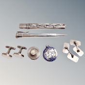 A collection of silver and white metal items to include pencil, needle case, cufflinks,