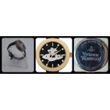 A Vivienne Westwood model: VV221GDBK black leather strap watch. Swiss Ronda movement.