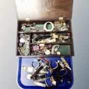 A tray containing a large quantity of lady's and gent's wristwatches contained in oak storage box