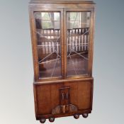 A 1920's oak glazed bookcase