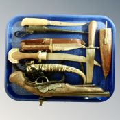 A tray of replica black powder pistol, vintage and later knives, Indian knife in scabbard,