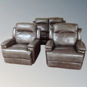 A brown leather two seater reclining settee with two matching armchairs