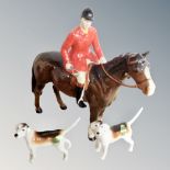 A Beswick Huntsman on horse (as found) together with two further fox hounds