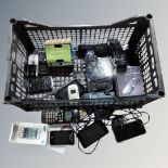 A crate of assorted vintage and later mobile phones, Nokia, Samsung, Sony,