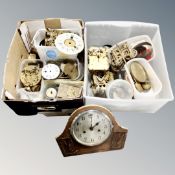 Two boxes of clock parts