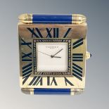 A Cartier Paris Quartz travel clock, numbered 355116920, width 5 cm.