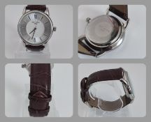 An Infinite Men's watch. and film on back, with chunky branded Infinite brown leather watch strap.