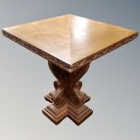 Eight carved pedestal tables,