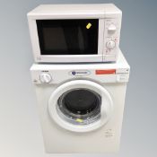 A white electric microwave and a White Knight dryer