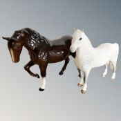 A Beswick Welsh Mountain pony, grey, and a Trotting mare, brown.