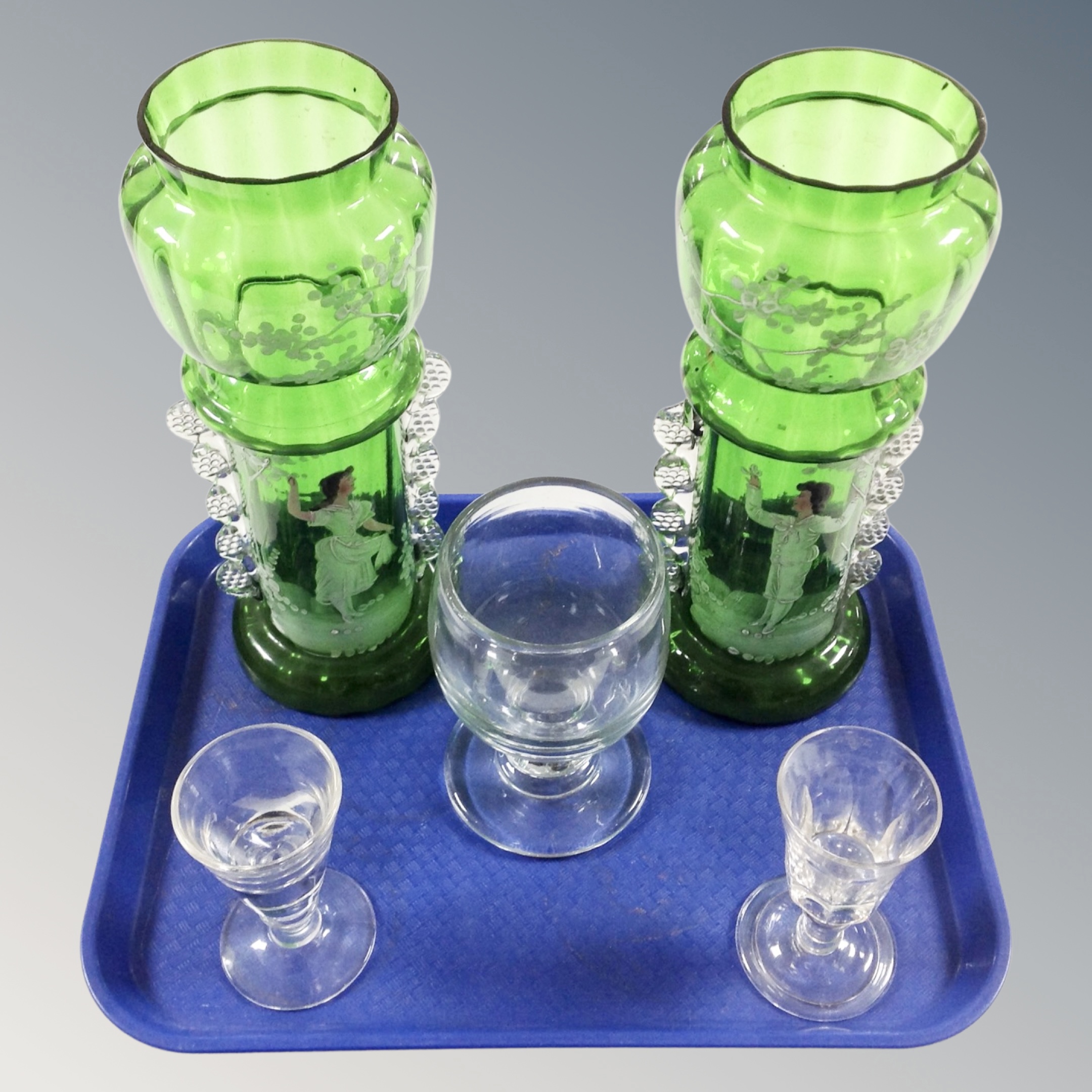 A tray of pair of Mary Gregory style painted green glass vases,