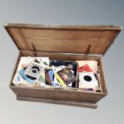 An antique pine box containing a large quantity of records, 78's,