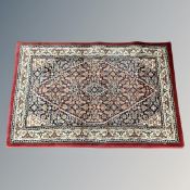 A machined rug of Persian design,