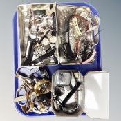 A tray of lady's and gent's wristwatches in two tins