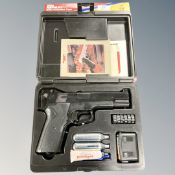 A Crosman 1008 Repeater .177 CO2 powered air pistol in case.