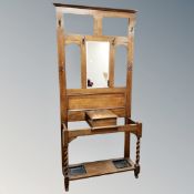 A Victorian oak mirrored hall stand