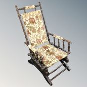 An Edwardian beech rocking chair and a small matching footstool (2)