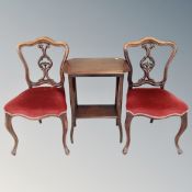 A pair of Victorian salon chairs together with an occasional table