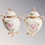 A pair of Noritake hand painted gilded vases with lids,