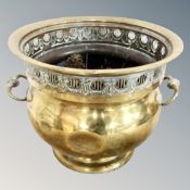 A 19th century brass twin handled planter with pierced rim,