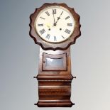 A 19th century inlaid mahogany drop dial wall clock