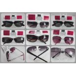 A collection of F&F Fashion sunglasses with their price tags.