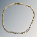 An 18ct three-tone gold necklace, diagonal block link design,