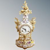 A V & A museum porcelain and gilded mantel clock with key