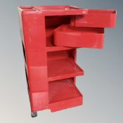 A 20th century Joe Columbo design 'Boby' red plastic trolley (a/f) CONDITION REPORT: