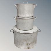 Three aluminium cooking pots