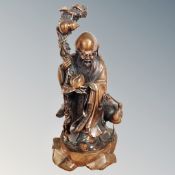 A bronze effect Oriental figure - Sage,
