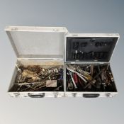 Two metal hard cases containing tools