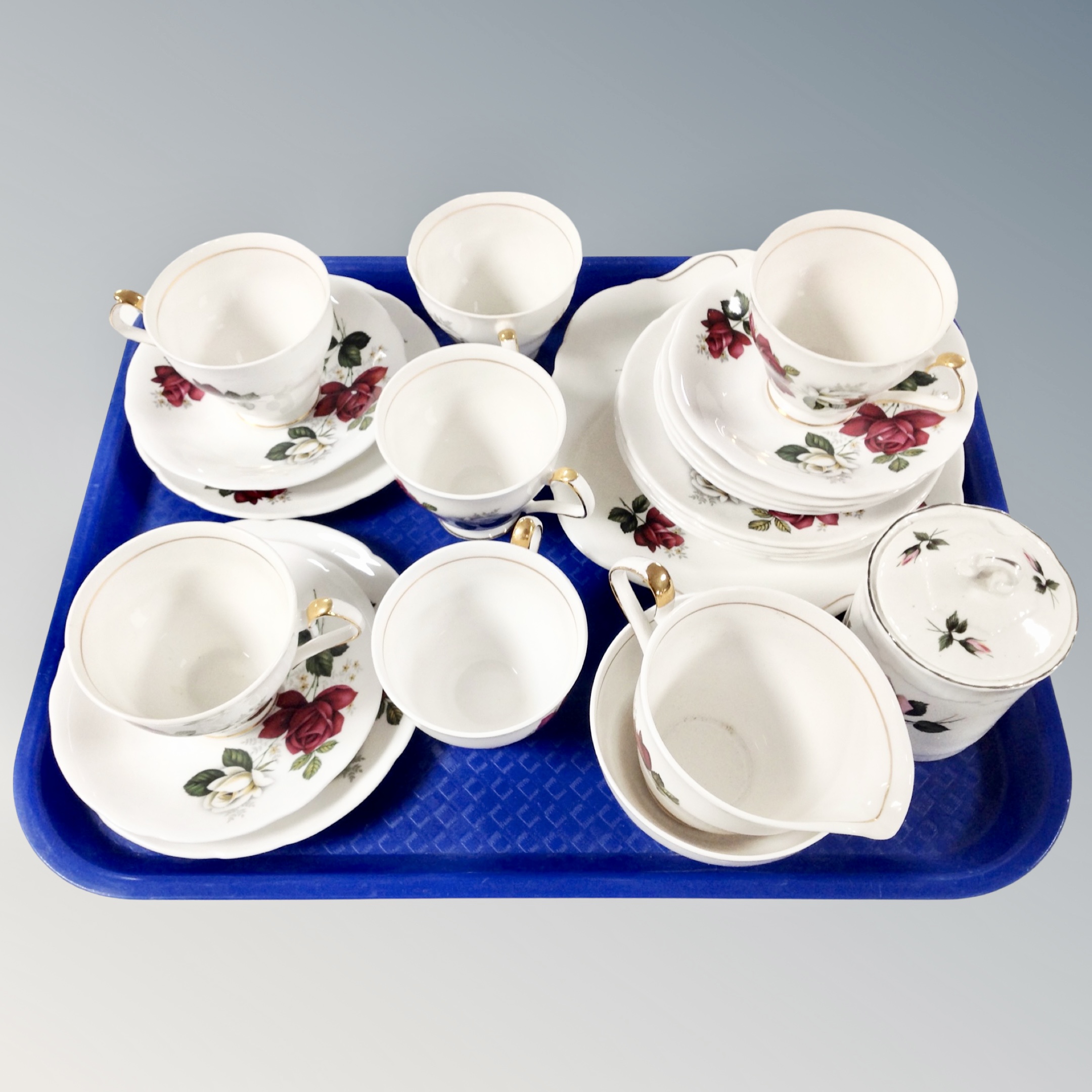 Twenty two pieces of Royal Windsor bone china decorated with roses