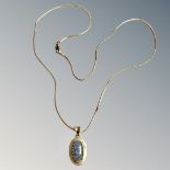 An 18ct yellow gold mounted blue green Australian opal pendant,
