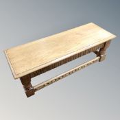 A rectangular oak low table,