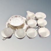 A twenty one piece Royal Osborne pink rose bone china tea service