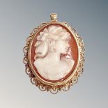 A shell carved cameo brooch mounted in 18ct yellow gold, 7.3g gross.