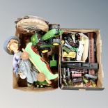 Two boxes containing model trains, rolling stock, Thomas the Tank Engine toys, wooden cart,
