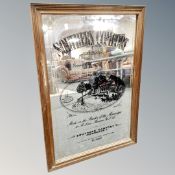 A Southern Comfort picture mirror, framed.