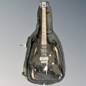 A Vintage electric guitar in carry bag.