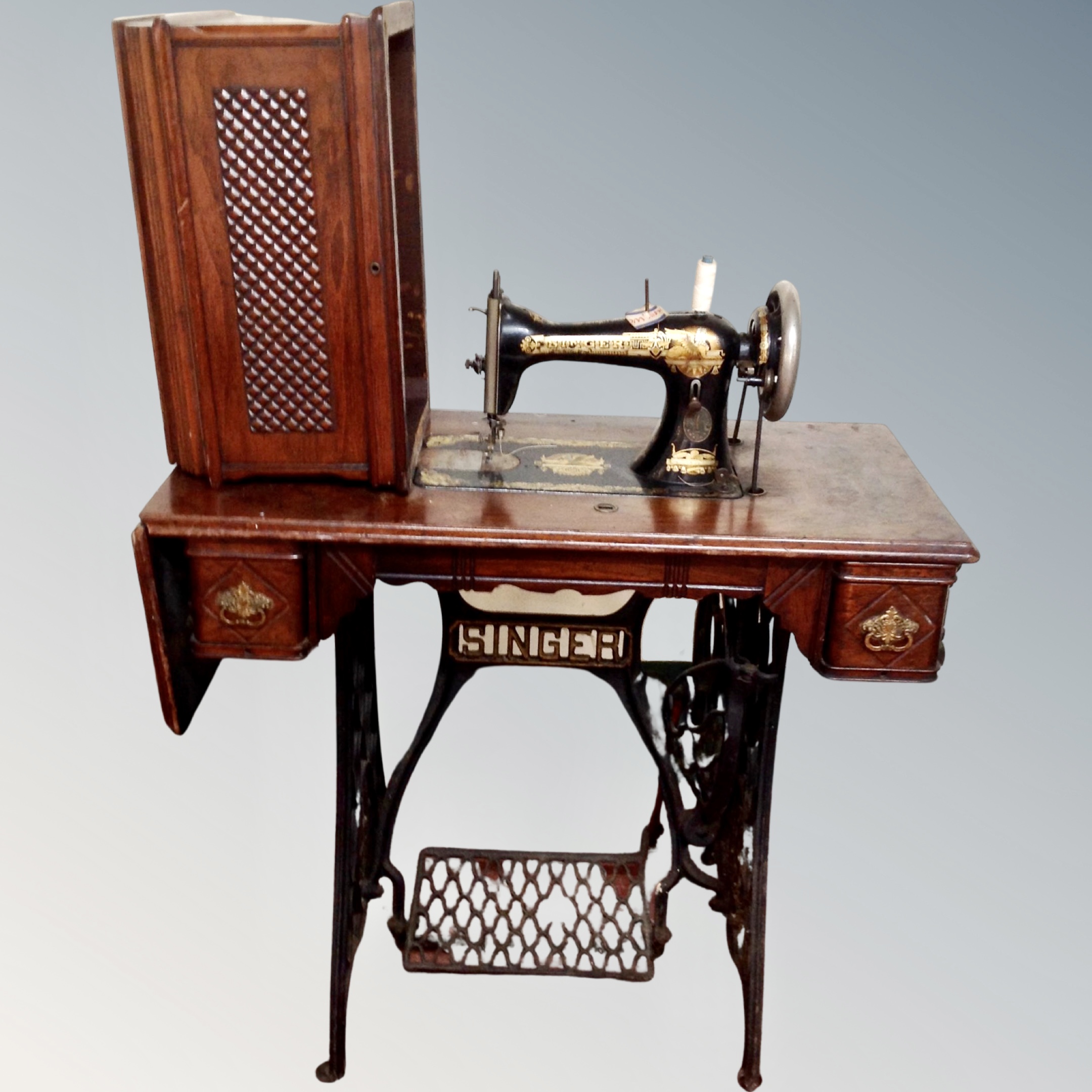 A Victorian Singer treadle sewing machine
