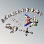 A collection of silver and white metal jewellery to include enamelled butterfly brooches,