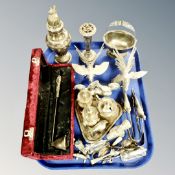 A tray of assorted plated wares, sugar sifter, animal ornaments, sugar tongs,