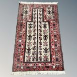 An Afghan/Caucasian prayer rug,