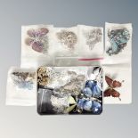 A tin of fifteen pieces of butterfly jewellery, gem and stone decorated pendants,