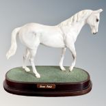 A Royal Doulton horse figure of Desert Orchid on plinth