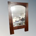 A hardwood contemporary mirror