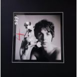 A later silver gelatin photo of Paul McCartney posing for photographer Richard Avedon in London in