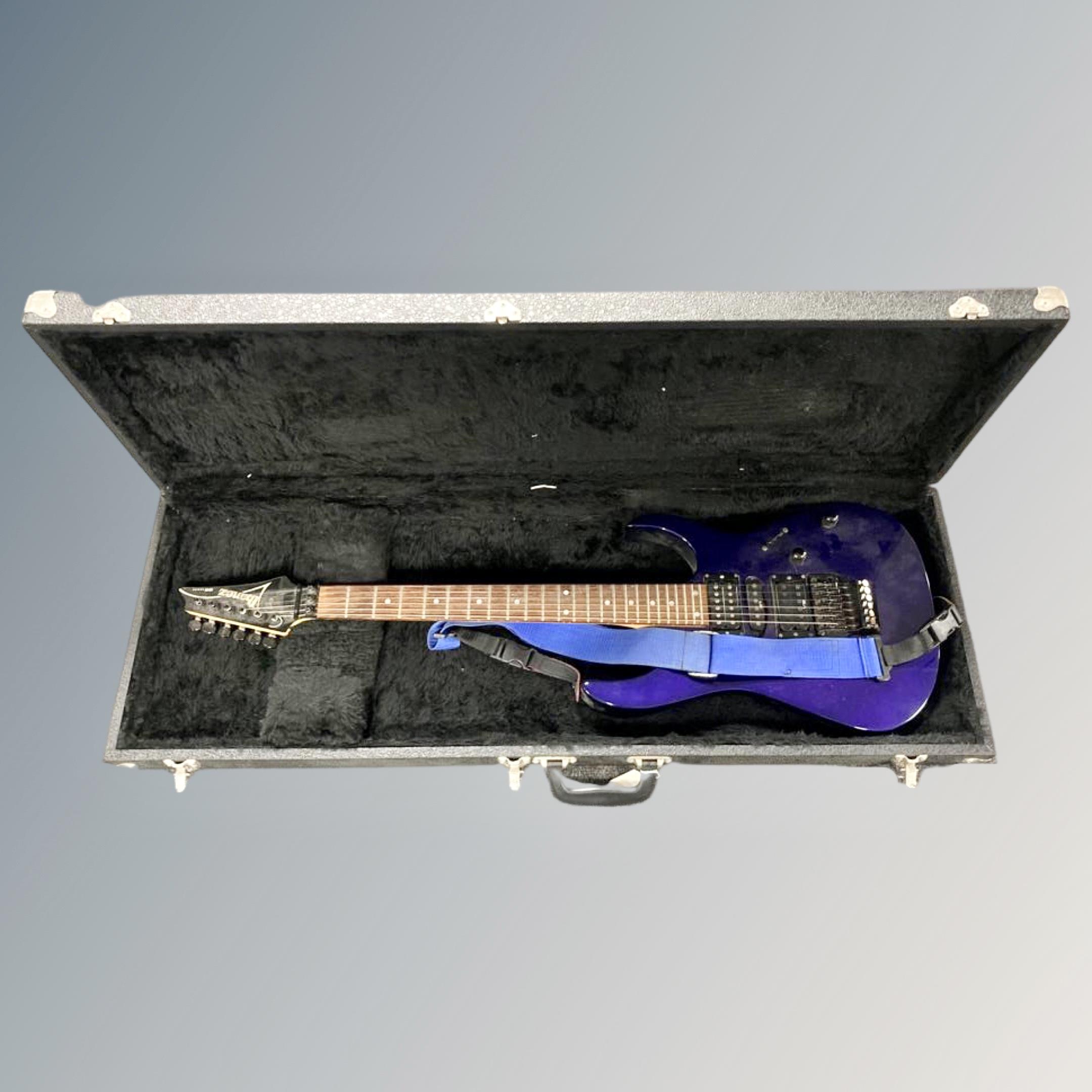 An Ibanez electric guitar, serial number F9705221, Made in Japan, in hard carry case.