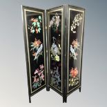 A Japanese style three fold screen